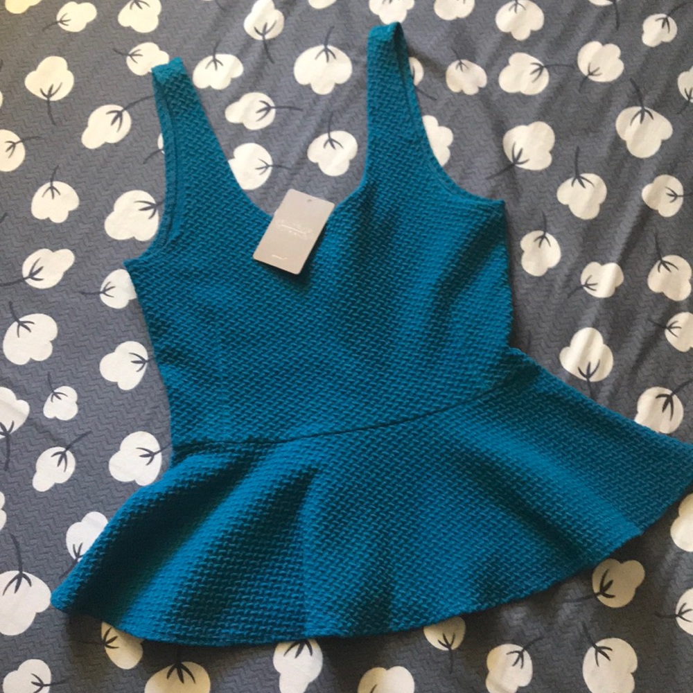 Brand new Anthropologie peplum top